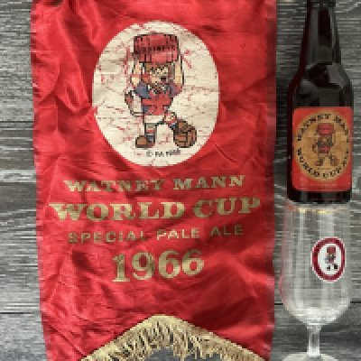 1966 World Cup Pale Ale Bottle Glass + Pennant: Would look stunning in a bar especially in the 60th anniversary. An original Watney Mann pennant, glass and incredibly an unopened bottle of Pale Ale all featuring WC Willie holding a barrel. (3)