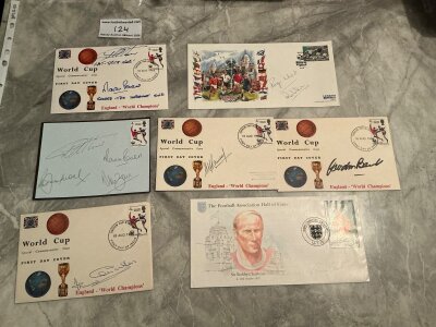 England 1966 Football Team Signed First Day Covers: 6 fist day covers plus a page which looks like a fdc signed by Moore Ball Peters and Hurst with COA from reputable source. Individual signatures on fdcs signed by B Charlton J Charlton Wilson Banks and Ramsey. Additionally again with reputation COA a fdc signed by Hurst stating hatrick hero with Peters stating scored the important one. 11 autographs on 7 items.