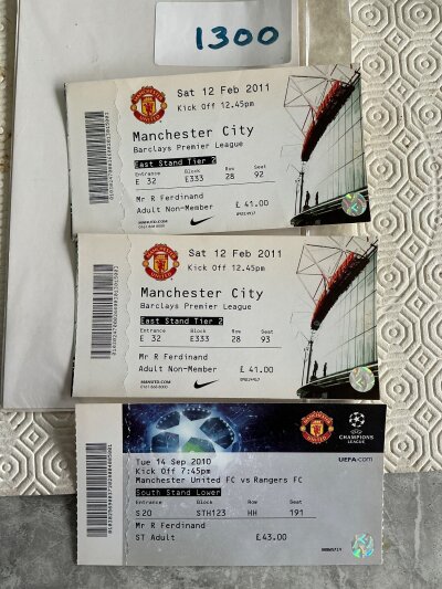 Rio Ferdinands Manchester United Home Football Tickets: From 2010/11 there are 2 v Manchester United and 1 v Rangers all in Rios name. (3)