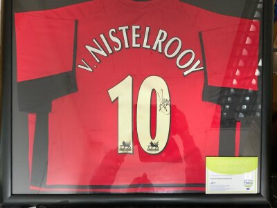 Van Nistelrooy Manchester United Signed Framed Football Shirt: Frame measuring 30 x 25 inches and contains a red home shirt hand signed by Rudd with COA.