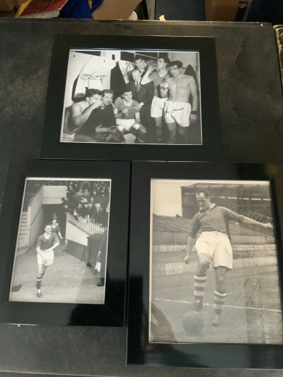 Manchester United Signed Gramed Football Photos: Press photo signed by Johnny Carey and two other photos one signed by Scanlon the other has 4 signatures which are Gregg Compton Foulkes and one other. (3)
