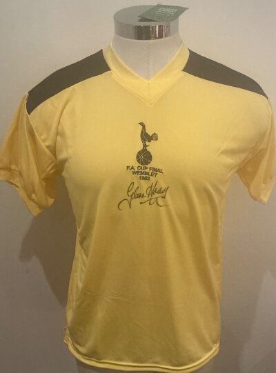 Hoddle Tottenham Signed Replica Football Shirt: Yellow Tottenham shirt signed to the front with players full signature. Excellent condition Score Draw reproduction shirt with detailing of the 1982 FA Cup final Comes with COA from reputable source.