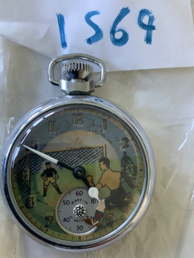 Football Pocket Watch: Ingersoll Triumph stop watch in working order depicting a football scene. Good condition.