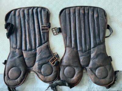 1940s Football Shin Pads + Studs: Original pair of leather shin pads and ankle protectors. C/W 2 boxes of rubstuds which you basically nail to your boots.