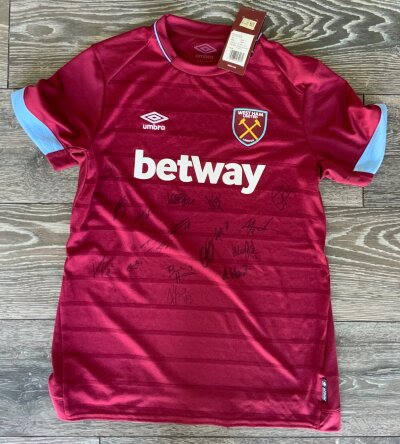 West Ham 2018 - 2019 Signed Football Shirt: Home shirt with 16 autographs to front collected by West Ham member of staff. Shirt is brand new with tags. Size womens 12.
