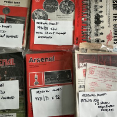 Arsenal Home Football Programmes: Nice collection which include match reports with programmes from 1949 to 1980. Most programmes have writing to cover with either score or attendance. Many seasons are complete. Comes with a programme binder, 44 handbooks and a few booklets. Instructions to sell. (4 small boxes)