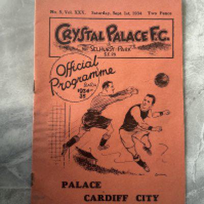 1934 - 1935 Crystal Palace v Cardiff City Football Programme: Fair condition league programme with stain and rusty staple holding firm. Team changes. 