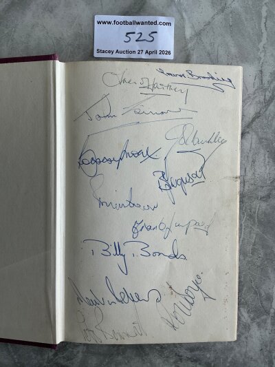1967 West Ham Squad Signed Football Book: The World Game by Geoff Hurst. 1967 hardback book without dust jacket produced by Stanley Paul. Signed by Geoff Hust on title page inside and 12 of his 67/68 West Ham team mates on inner blank page. Signatures of Moore Bonds Lampard Ferguson Sissons Brooking Peters Boyce Bennett Dear Cushley and Hartley.