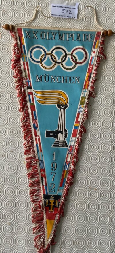 1972 German Olympics Large Original Pennant: Stunning pennant produced 54 years ago but remaining in excellent condition. Vibrant colours with participating nations flags to border. Measures 20 inches long.