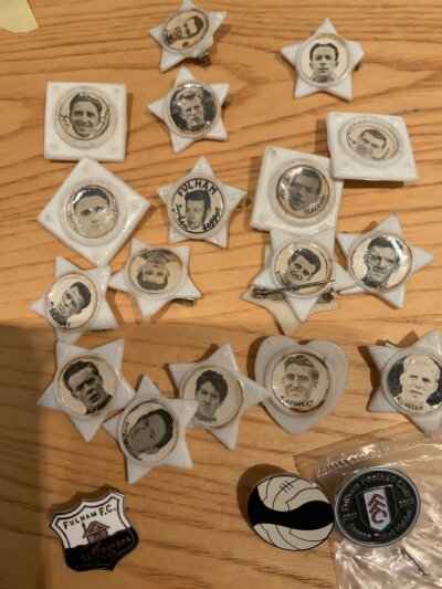 Fulham Football Badges + Programmes: Includes 13 star badges plus 5 square badges of the same era. Players include Macedo, Mullery, Haynes and Bentley. C/W over 20 early 1960s mainly home programmes. In addition there are two Johnny Haynes books.