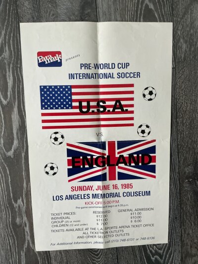 1985 USA v England Football Advertising Poster: Colourful large poster advertising match on 16 6 1985 in Los Angeles. Excellent condition measuring 60 x 38cm.