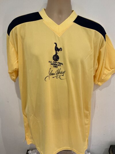 Hoddle Tottenham Signed Replica Football Shirt: Yellow Tottenham shirt signed to the front with players full signature. Excellent collection Score Draw reproduction shirt with detailing of the 1982 FA Cup final Comes with COA.