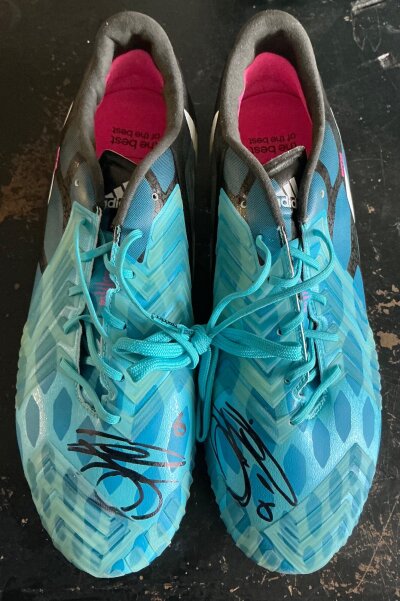 Phil Jagielka Match Issued Everton + England Football Boots: Brand new Adidas Predator pair of football boots with spare unused studs. Has the year 2014 and the letters EMZ a reference to his wife at the time Emma. Size UK 9.