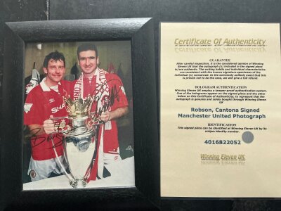 Manchester United Signed Framed Photos: Cantona + Robson with FA Cup signed by both with COA. C/W Giggs scoring v Arsenal in 1999 FA Cup semi final signed Ltd edition print and 2 more small framed photos including Ronaldo. (4)