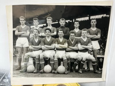 Manchester United 1957 Youth Cup Winning Press Photo: Large black and white photo of the team that beat West Ham in the finals. Press stamp and annotation to rear.