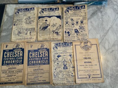 Chelsea Scrapbook + Memorabilia: Scrapbook from the Kerry Dixon David Speedie era and a further older one containing an Evening Standard newspaper celebrating the win in Athens in 1971 and a small amount of World Cup 1966. There are 13 Bridge News newspapers from 85/86 and 7 home programmes from 1946 - 1948 in fair condition.