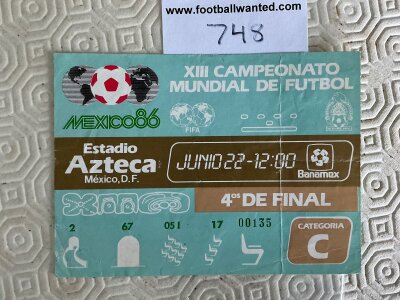 1986 World Cup Argentina v England Football Ticket: Famous hand of god match played at the Aztec Stadium where Maradona famously punched the ball into the net past Peter Shilton. Genuine ticket has fold and slight marks to rear where previously stuck down.