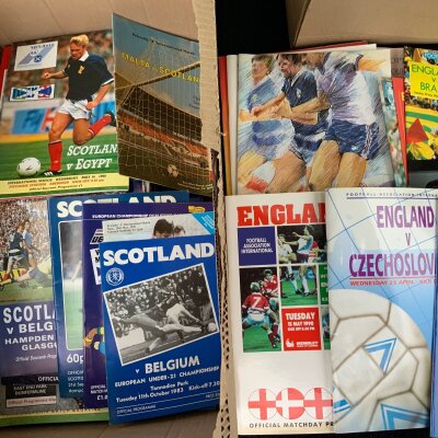 England + Home Nations Football Programmes: Large box containing many programmes from Scotland Wales Northern Ireland Eire and a few England. Quantity with instructions to sell.