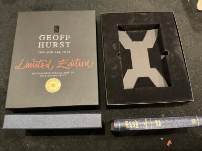 Geoff Hurst 1966 And All That Signed Boxed Book: Autobiography hand signed without dedication to book and title card. Book slides into hardback slip case then fits into large black velvet box before going into a further hard slip case which matches the book stating Ltd edition 890/100. Nice item.