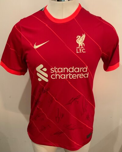 Liverpool 2022 - 2023 Signed Football Shirt: Red short sleeve home shirt. Multi signed to front by 13 of the team. COA from Liverpool.