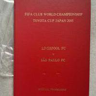 2005 Sau Paulo v Liverpool Hardback Football Programme: FIFA Club World Cup programme known as the Toyota Cup played in Japan. Looks like the tournament programme inside. Hard cover has a few small dents. 