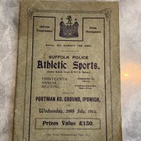 1914 Suffolk Police Programme At Portman Road Ipswich: 34 page excellent condition programme dated 29 7 1914 only one day after World War One had started. This was a major athletics event with the king as patron and the Cobbald family officiating. It is believed the British Army trained on this ground during the war and as a result was not used again until 1920 due to damage. Middle page loose due to rusty staples.