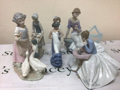 A Collection of Lladro NAO and one other conforming figure (6)
