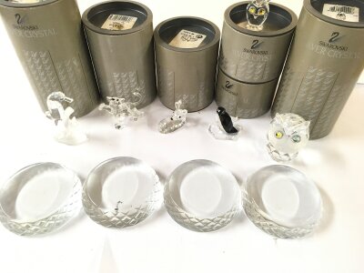 A Large Collection Of Boxed Swarovski Crystal.