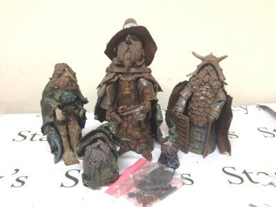 A collection of Vintage Clare Craft glazed ceramic figures of Wizards hight 38cm  and associated figures the large Wizard holding a glass alchemist flask this figure having no obvious damage with other figures some with loose parts