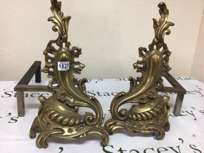A Pair of Brass French Rococo style andiron Chenets of scrolling form. Hight 42cm