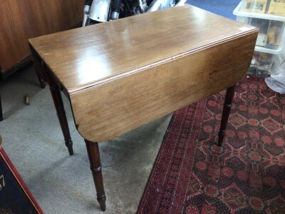 A late George III mahogany Pembroke table the twin flap top on ring turned legs. With a single drawer NO RESERVE.