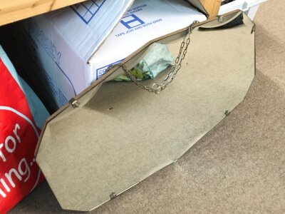 A lovely heavy scalloped edged mirror, 66cm wide