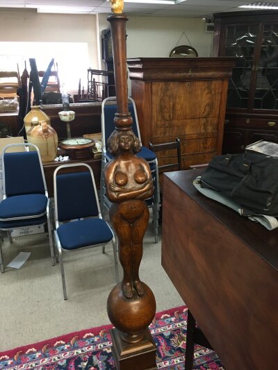 A 1930s carved oak standard lamp depicting a nude female figure, approx height 175cm.