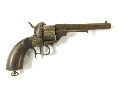 A Single-Action, Pinfire,Six-Shot Military Revolver.