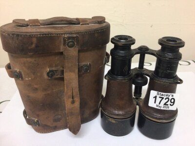 A pair of Military binoculars In a leather case French makers.