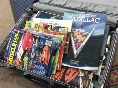 A case of vintage American car magazines and books including legend series muscle cars magazines, super tuning your firebird trans am, complete guide to American cars 1966-76 etc