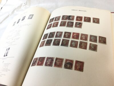 An album of British stamps including young Queen Victoria