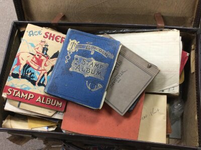 A case containing mixed world stamps including Victorian British used stamps