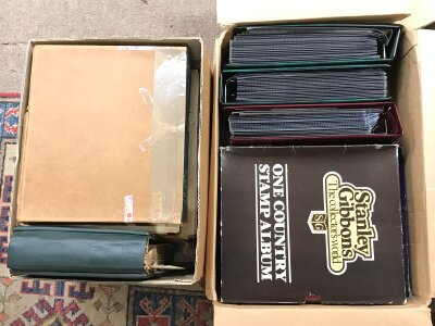 A collection of presentation packs and other stamp albums