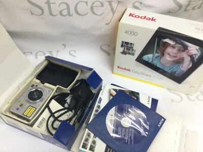 Vintage cameras including Kodak and boxed a boxed Sony digital DSCW110, Kodak brownie 127 , Trentor binoculars 8x30 etc