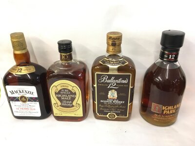 Four bottles of whiskey including Highland park , Mackenzie etc.