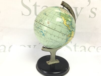 A vintage World globe with Union of S.S. republics , 21cm high including base, made in Chad Valley Co Ltd in England by Toy makers informed her majesty Queen Elizabeth II and Queen Mother.