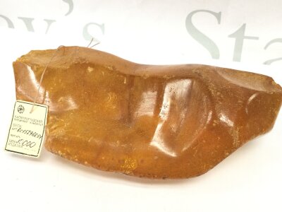 An extra large unworked amber boulder from Russian Kaliningrad amber factory , length 7” (18cm) , width 4.5” (11cm) , high 2.5” (under 7cm) weight 585 grams