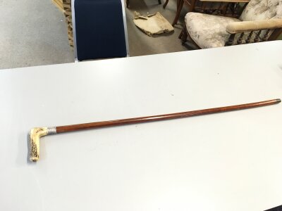 A sword stick with a silver hallmarked collar and a antler fritz handle. 91cm long. Blade 40cm long
