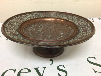 A Victorian Art Union Copper Tazza the centre with raised relief figures the outer edge with scroll and cherubs diameter 28cm  Art Union marks to the base. NO RESERVE