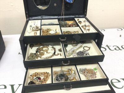 A jewellery box containing costume jewellery NO RESERVE