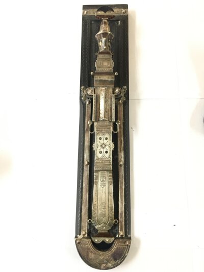 A East African Ceremonial Dagger In Silver Scabbed.