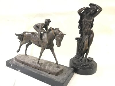 Two bronze figures including Aphrodite goddess figure and racehorse figure. 24 and 30cm tall
