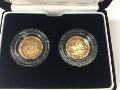 Two gold proof half sovereigns.