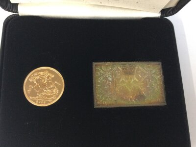 A 2003 sovereign with an ingot to mark coronation